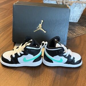 Nike baby Jordan’s ' Black and White Sneakers with Aqua Accents